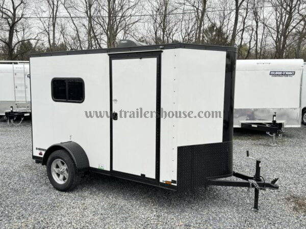 2024 Cargo Mate 5.5x10' Enclosed Toy Hauler Trailer 2990# GVW * TOY HAULER * FOLD OUT BED * WHITE BLACKOUT * SLANT V-NOSE * ALUMINUM WHEELS * .030 SCREWLESS EXTERIOR * REAR SPOILER * PLYWOOD FLOORS/WALLS * TABLE * MAX AIR COVER * EXTRA HEIGHT - Image 10