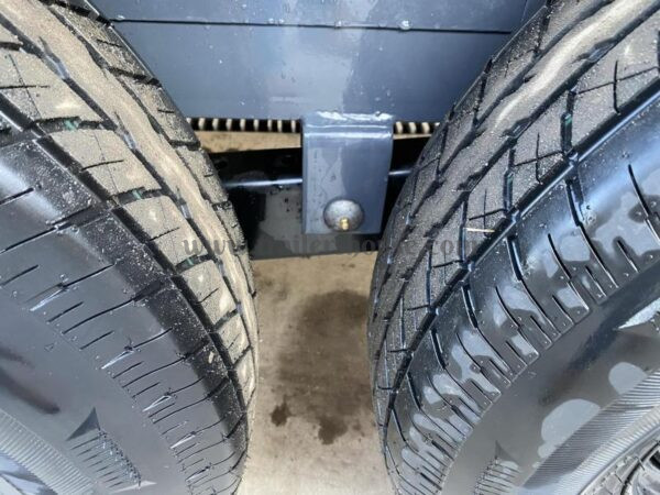 2024 Lamar 7x18' Equipment Trailer 14000# GVW * DELUXE OVERWIDTH RAMPS W/ HEAVY MESH * CHARCOAL POWDERCOAT * RUBRAIL/STAKE POCKETS/PIPE SPOOLS/D-RINGS * REM FENDERS * 12K JACK * CAST COUPLER * SPRING ASSIST * COLD WEATHER HARNESS - Image 22